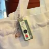YASHICA_FUNTASTIC_KEYCHAIN_CAMERA_Snoopy_s_Summit