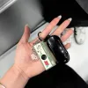 YASHICA_FUNTASTIC_KEYCHAIN_CAMERA_Snoopy_s_Summit_1